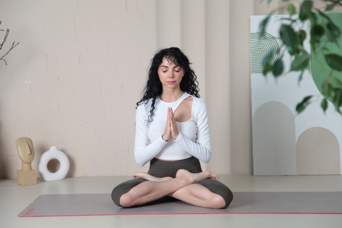 Yoga teacher demonstrating breathing techniques